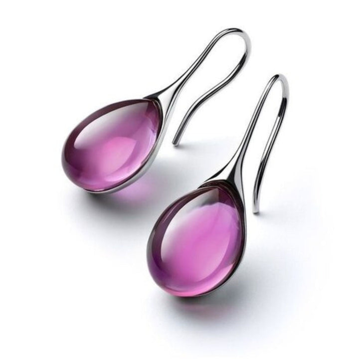 BOUCLES D’OREILLES EN CRISTAL D’OR ET D’ARGENT