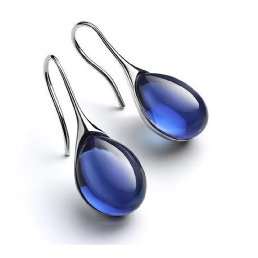 BOUCLES D’OREILLES EN CRISTAL D’OR ET D’ARGENT