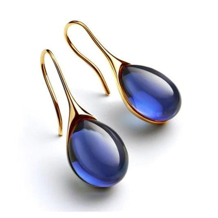 BOUCLES D’OREILLES EN CRISTAL D’OR ET D’ARGENT