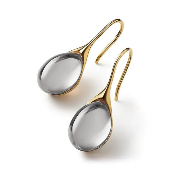 BOUCLES D’OREILLES EN CRISTAL D’OR ET D’ARGENT