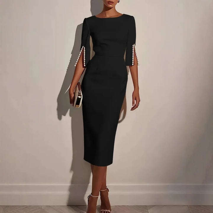 ROBE ÉLÉGANTE À MANCHES FENDUES ORNÉES DE PERLES