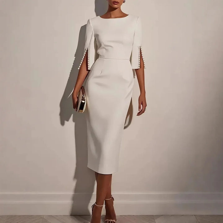ROBE ÉLÉGANTE À MANCHES FENDUES ORNÉES DE PERLES